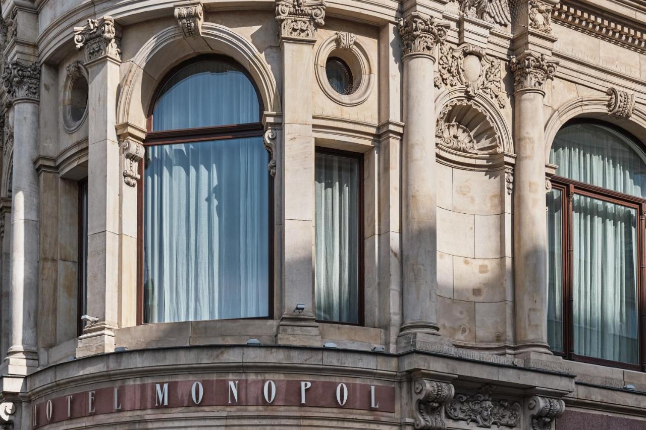 Hotel Monopol Вроцлав Екстериор снимка The hotel's name on the front of the building